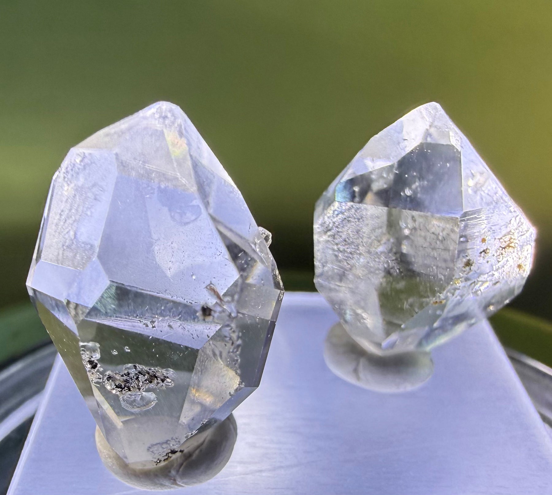 A collection of 5 Petite Herkimer Diamonds (Quartz) from Fonda, NY in  Suspension Frame