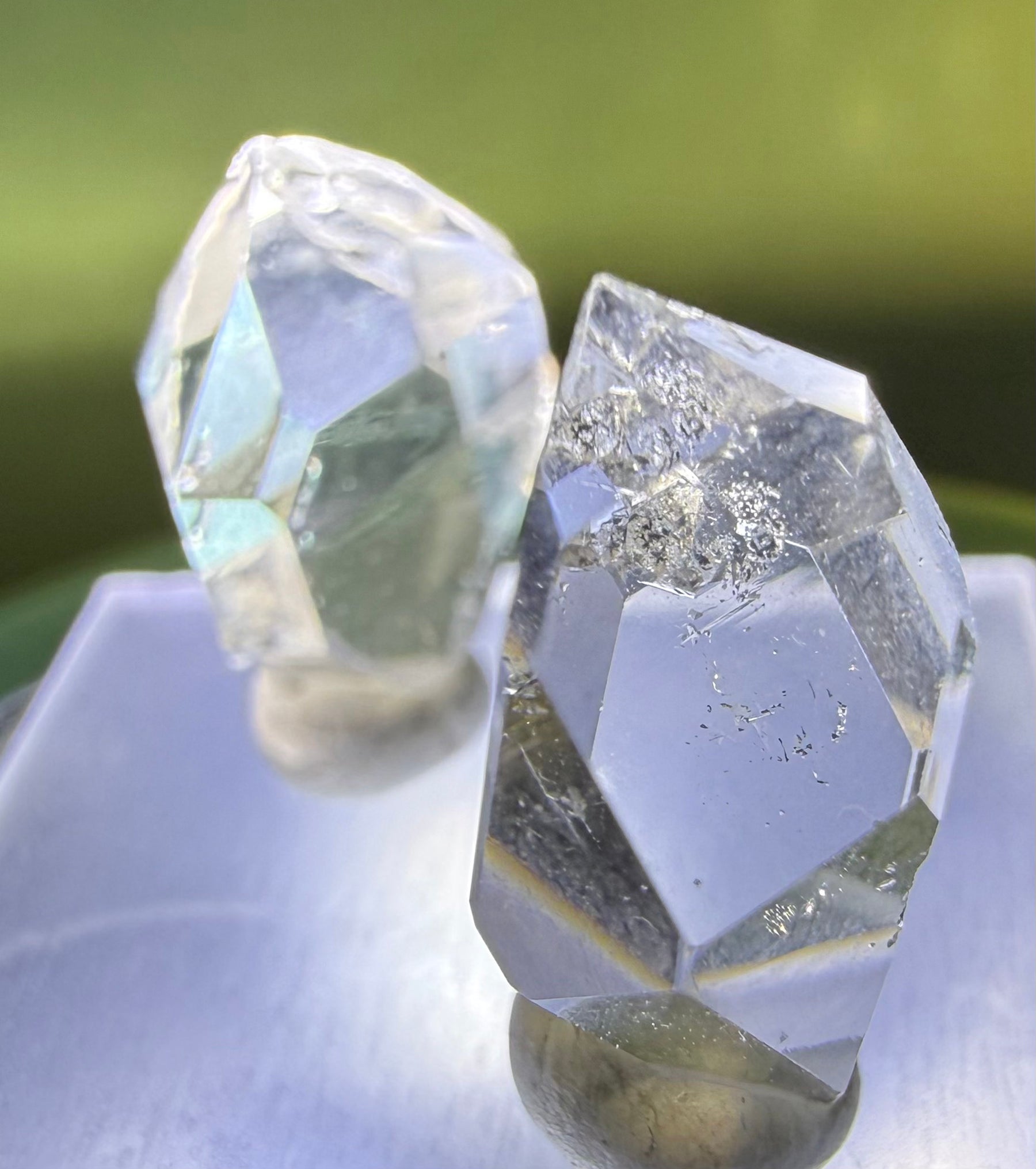 A collection of 5 Petite Herkimer Diamonds (Quartz) from Fonda, NY in  Suspension Frame