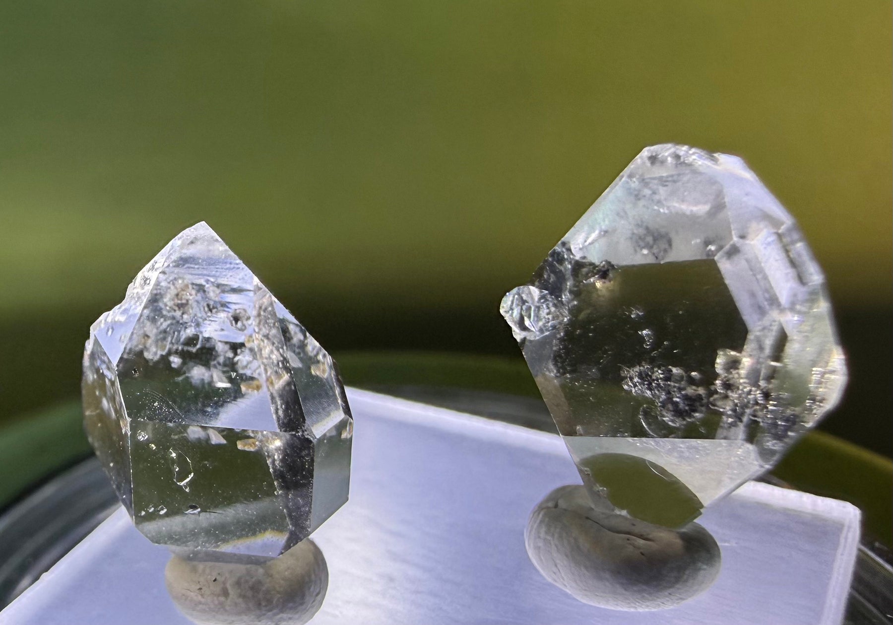 A collection of 5 Petite Herkimer Diamonds (Quartz) from Fonda, NY in  Suspension Frame