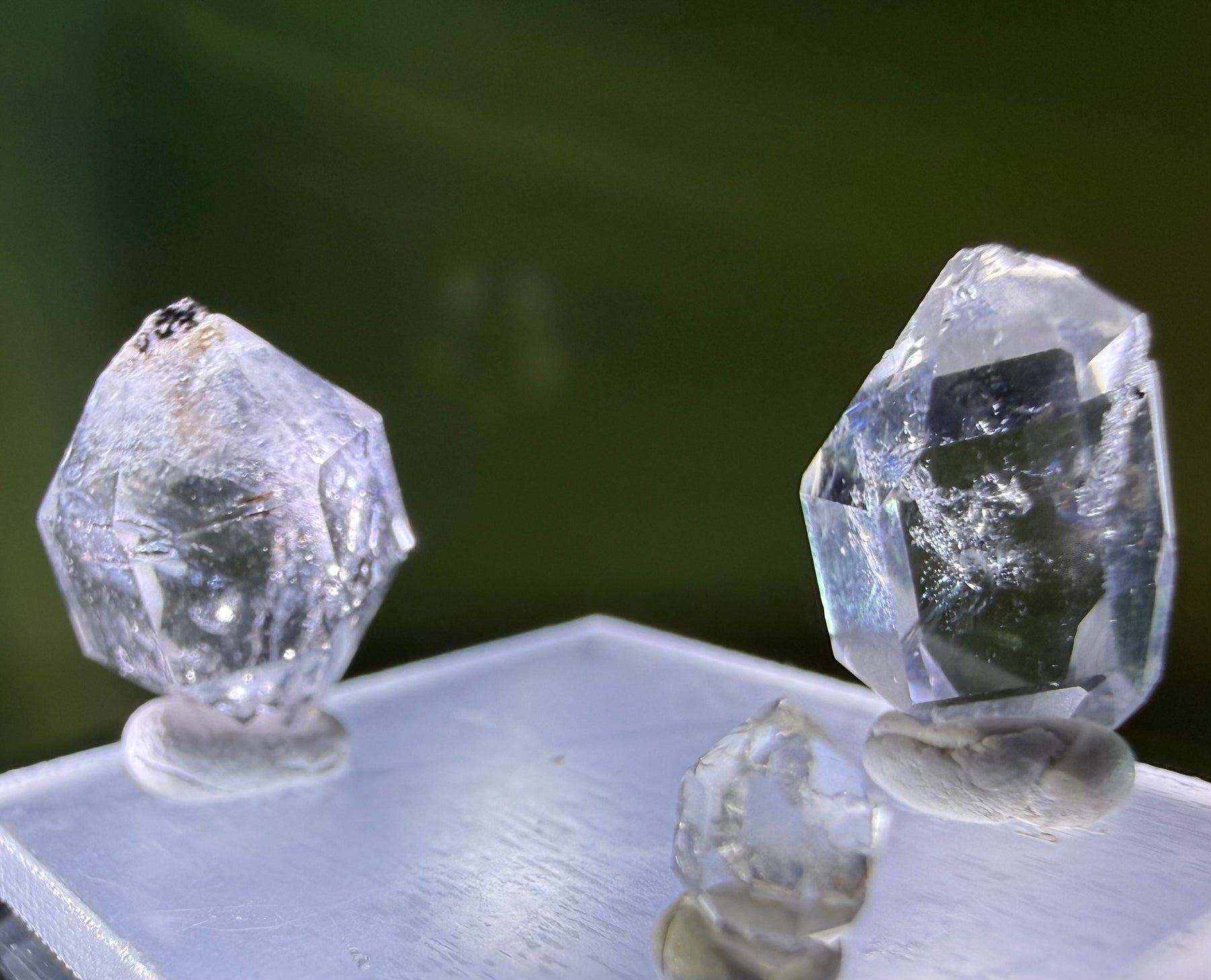 A collection of 5 Petite Herkimer Diamonds (Quartz) from Fonda, NY in  Suspension Frame