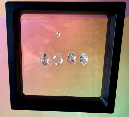 A collection of 5 Petite Herkimer Diamonds (Quartz) from Fonda, NY in  Suspension Frame