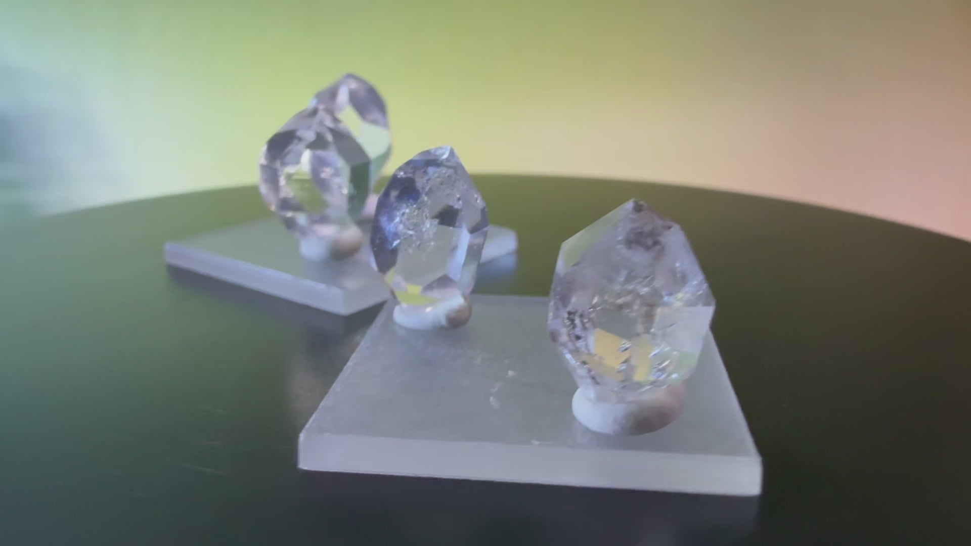 A collection of 5 Petite Herkimer Diamonds (Quartz) from Fonda, NY in  Suspension Frame